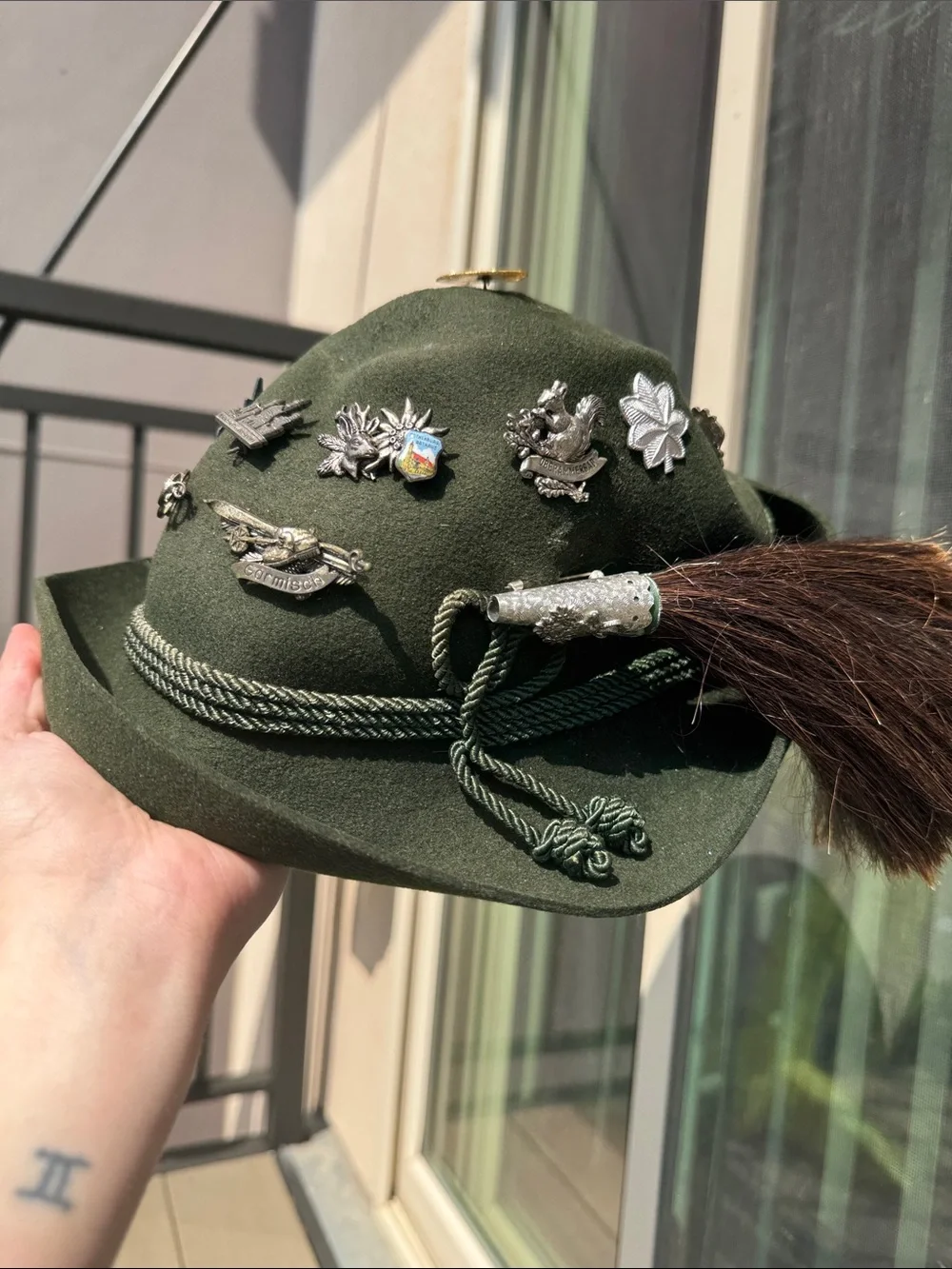 Dark Green Felt Alpine Hat with Decorative Pins and Ponytail Tassel